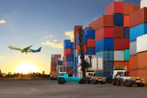 Forklift handling container box loading to truck