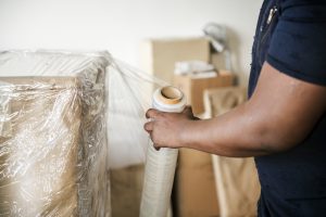man moving furniture