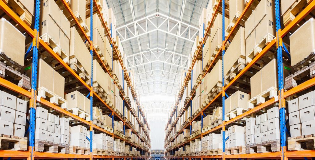 A warehouse with an overflow of boxes