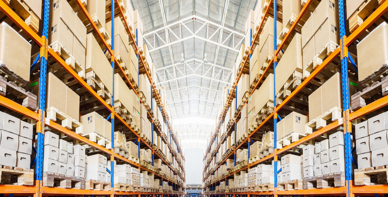 A warehouse with an overflow of boxes