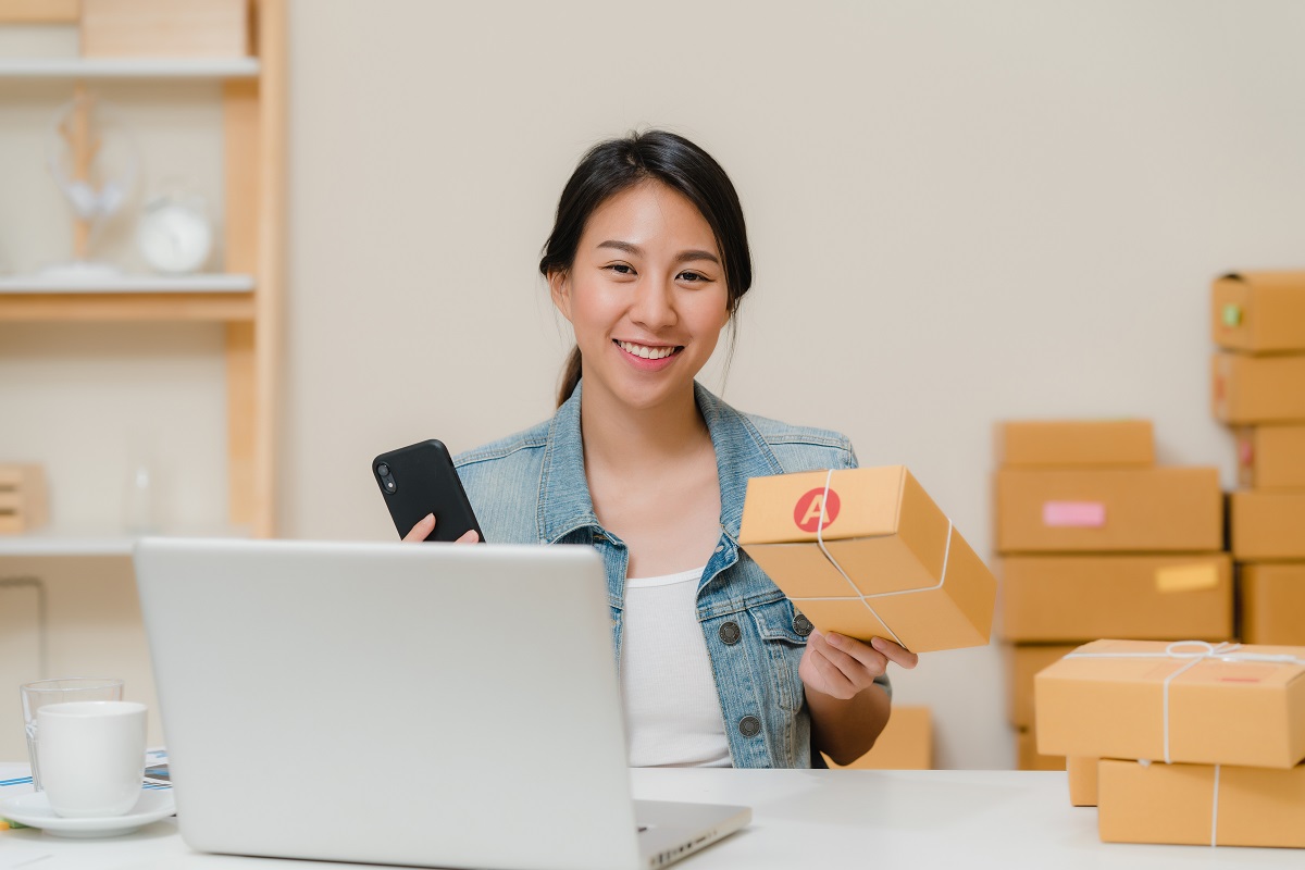 Beautiful smart Asian young entrepreneur business woman owner of